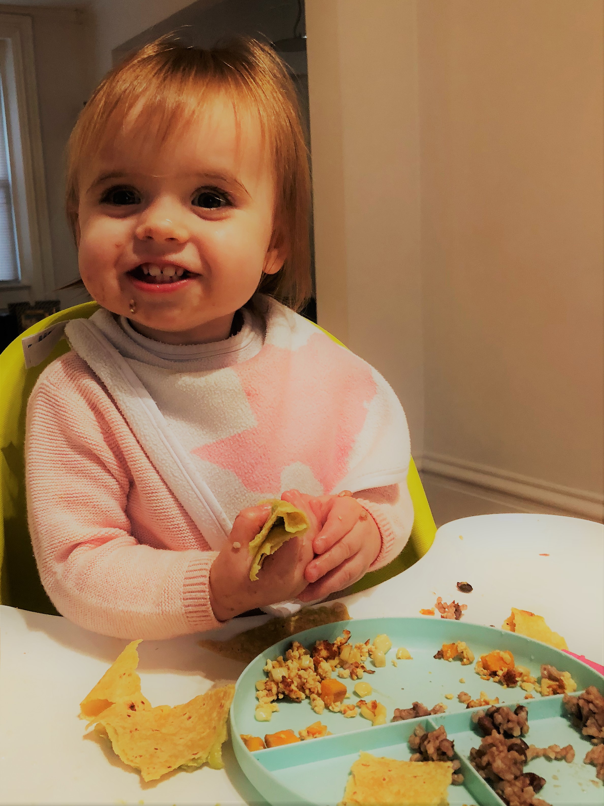 Cora Eating Tacos